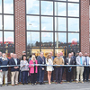 Lots of local officials and others turned out last week to help cut the ribbon and officially open Clintwood’s new Food City store. The 45,000-square-foot supermarket includes a bakery and deli, a floral boutique, a pharmacy, a Starbucks café and more.  CHAMBER OF COMMERCE PHOTO