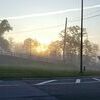 The sun peeks through the morning fog last Thursday as students were making their way to the Ridgeview schools complex.  JO HAMILTON PHOTO