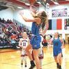Haley Sutherland goes for the reverse layup as the Lady Wolfpack stopped Central. PHOTO BY CRYSTAL COUNTS