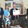 On hand for the check presentations were Board of Supervisors Vice Chair Josh Evans, Chair Peggy Kiser, VCEDA chief executive Jonathan Belcher, park Superintendent Austin Bradley and County Administrator Larry Barton.  VCEDA PHOTO